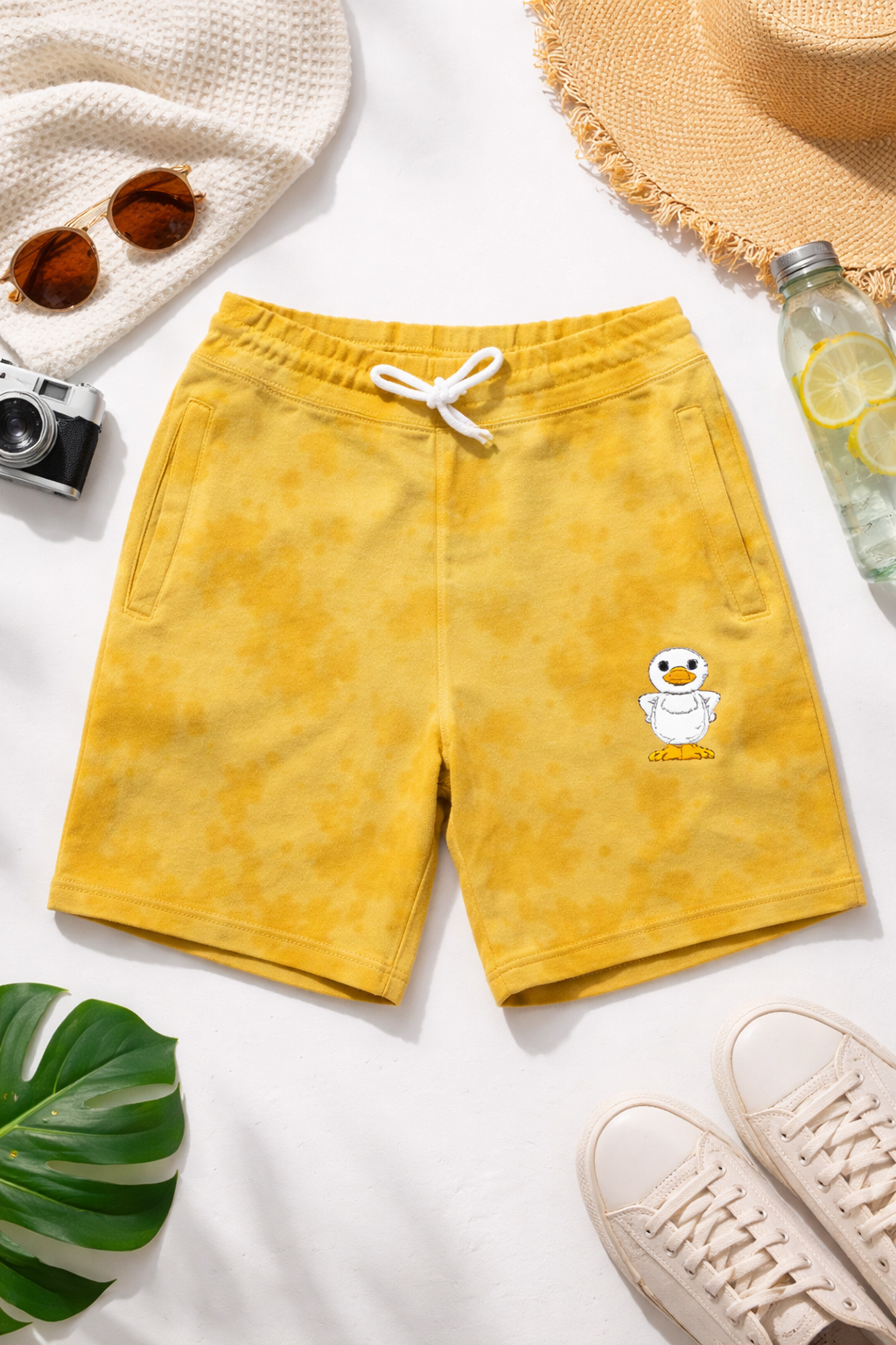 Mustard Tie-Dye Cotton Shorts with Embroidered Duck Graphic